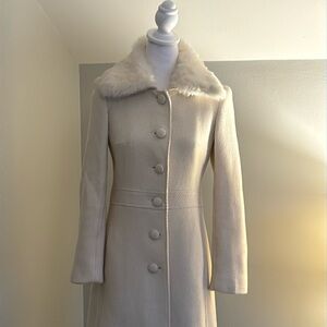 Marvin Richard’s white wool coat